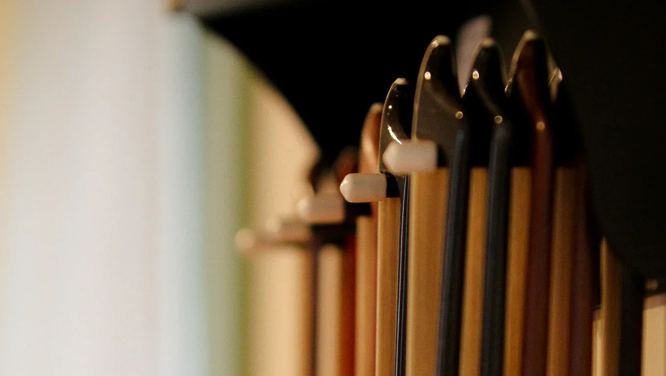 CodaBow and Musing carbon fiber violin bows comparison showing different bow tips and construction for professional violinists